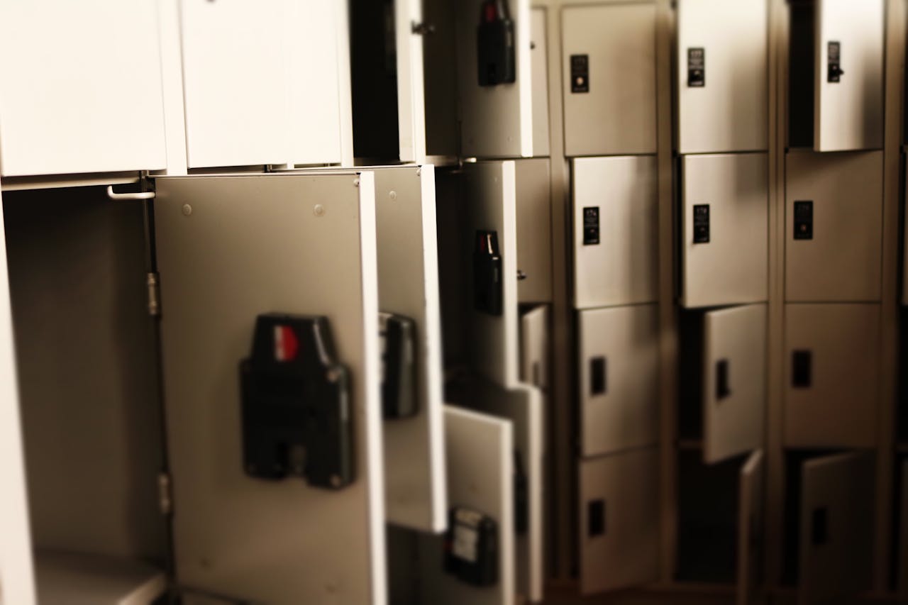 Mastering the First Impression: Your intriguing post title goes here A row of open lockers in a secure indoor storage area, ideal for storing valuables.